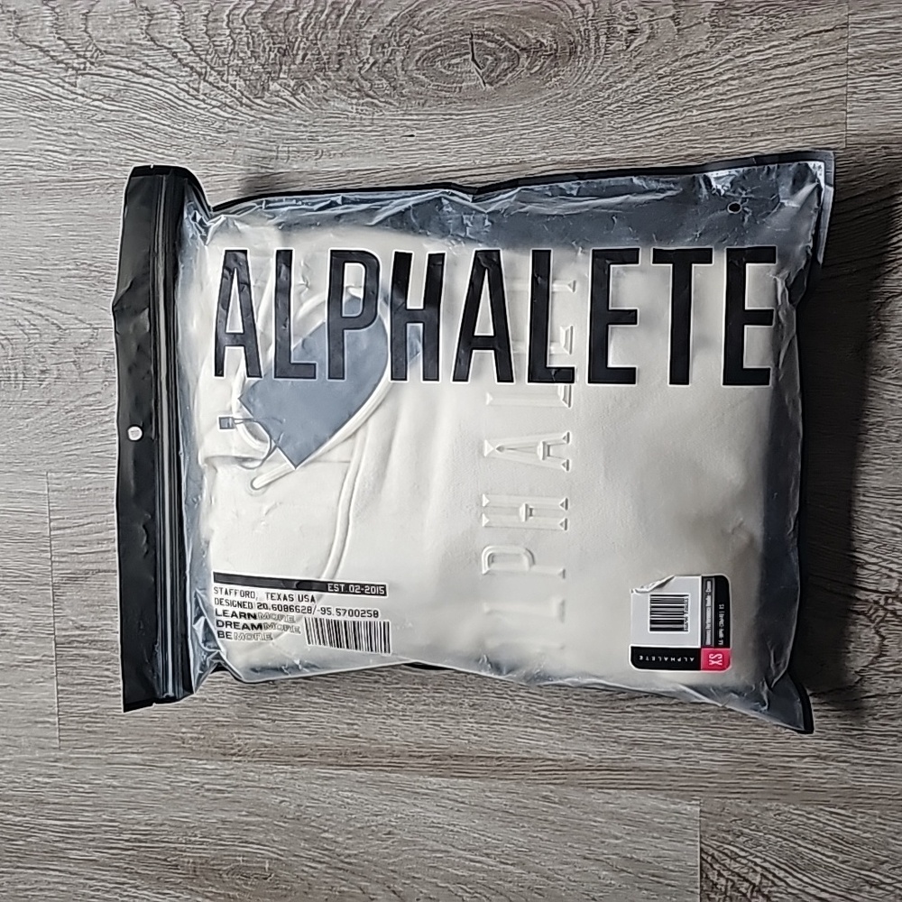 New in package. Alphalete hoodie. Cream. Womens xs.
